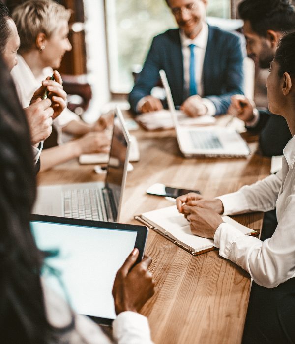Business Meeting Of Multi-Ethnic Office Workers, Selective Focus On Caucasian Business Woman Holding Pan, Coworkers Team Have Brainstorming In Board Room, Toned Image